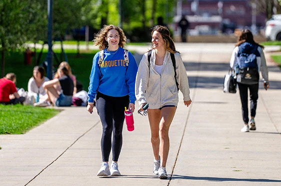 Students walking around Marquette campus