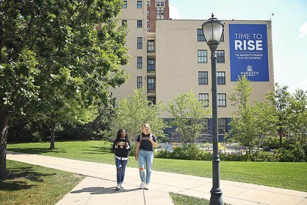 Students walking on Marquette campus