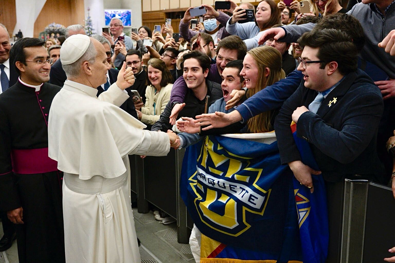 pope nick gross handshake