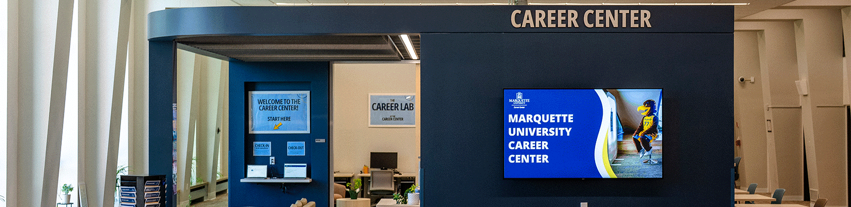A photo of Marquette University's Lemonis Center of Student Success on the fourth floor facing the student waiting area in front of some of the Career Center's offices 