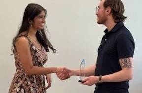 Dr Capone gives Tania Mishra the Turing Award
