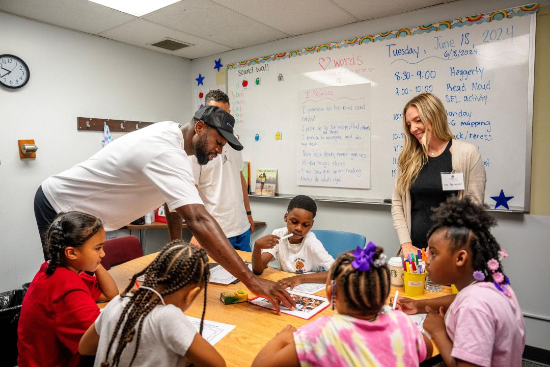 dwyane wade with children in classroom