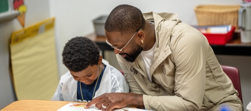 Dwayne Wade reads