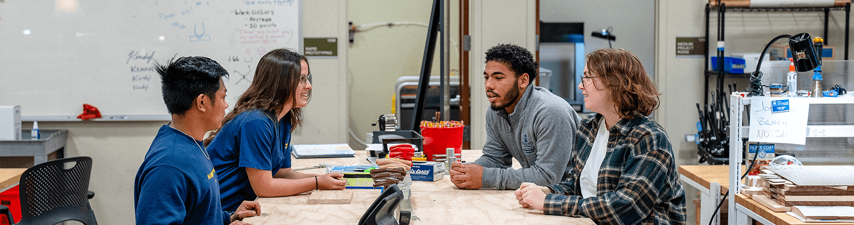 Students collaborating at a table