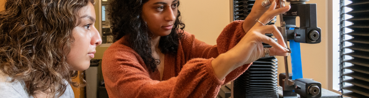 students collaborating in biomechanics lab