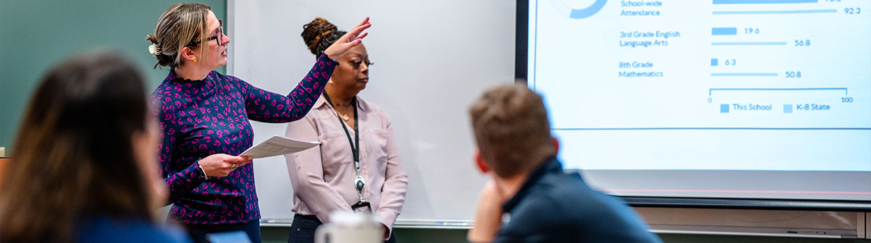 Education grad students talking on Marquette campus