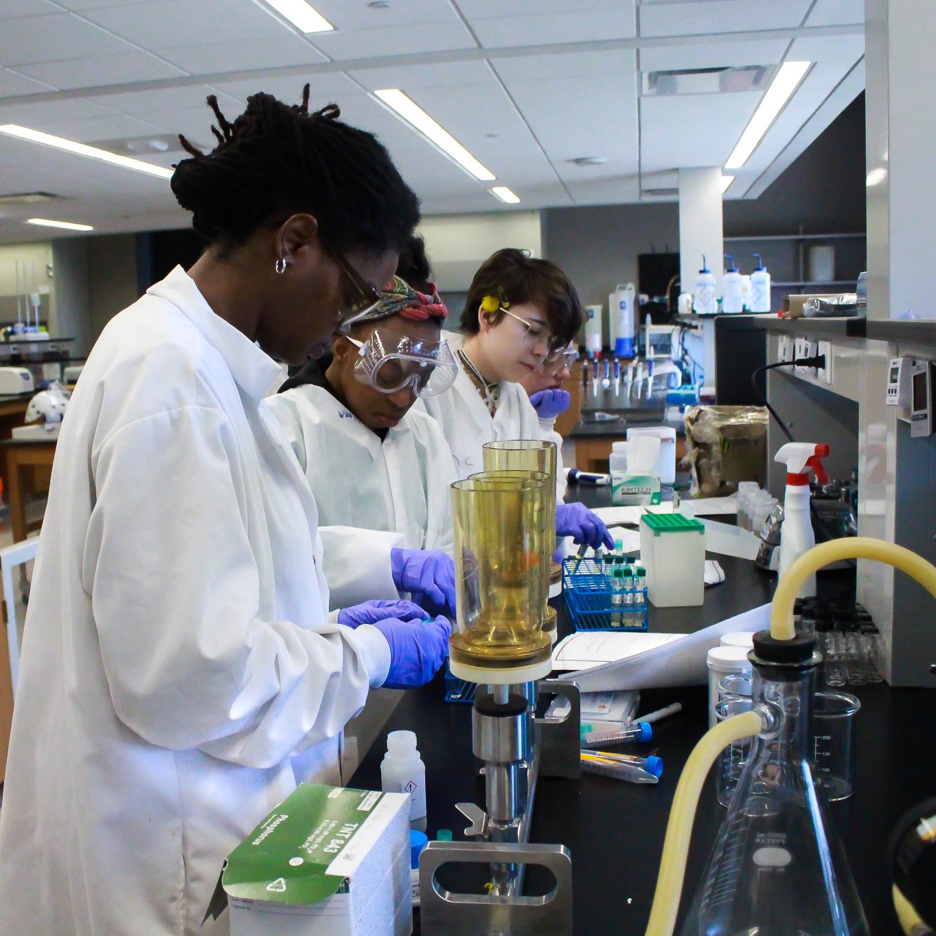 Dr. Young works on a water project with a student at the Global Water Center. 