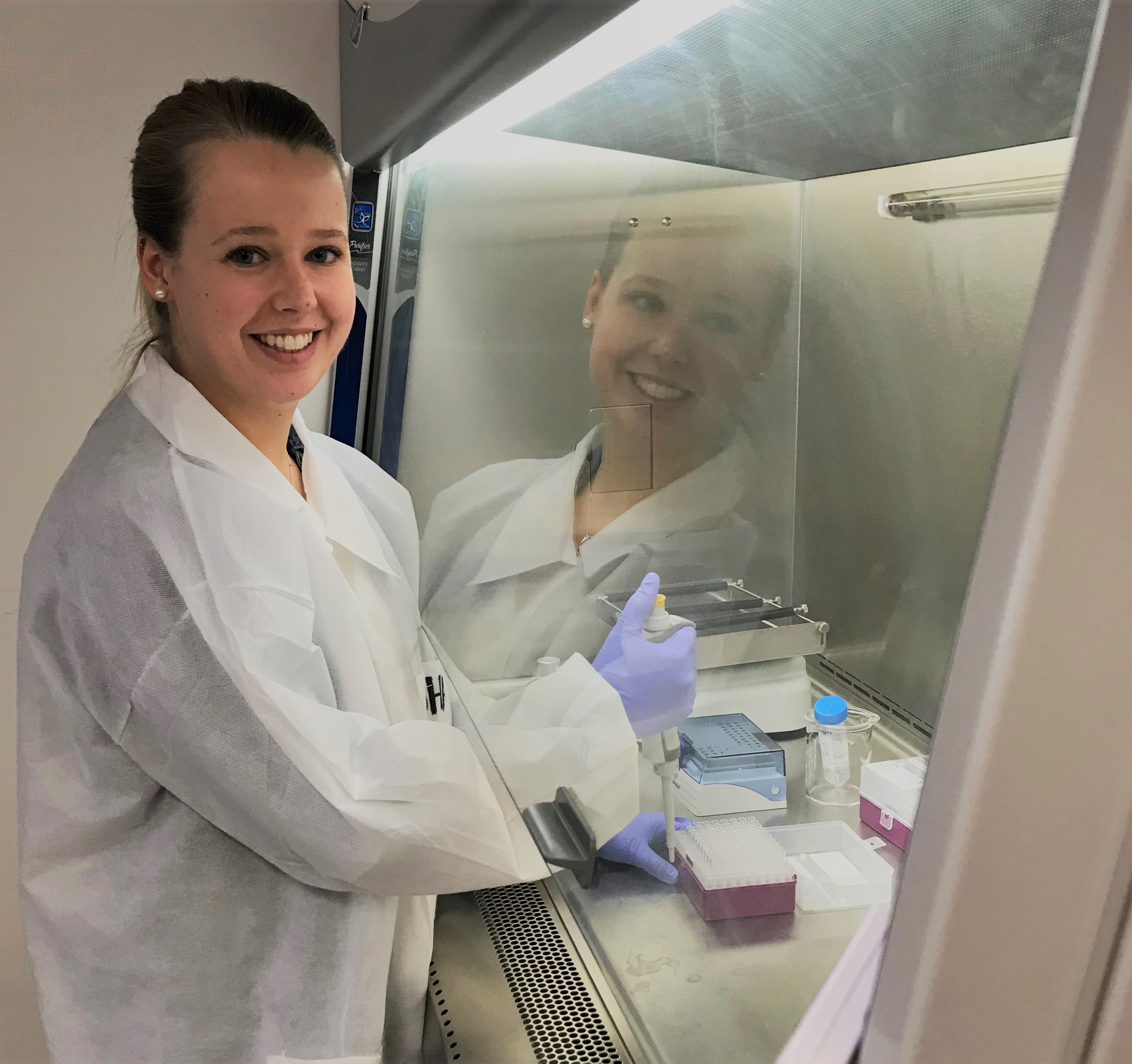 Student Kate Harrison conducts water research. 