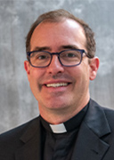 Rev. Eric M. Sundrup, S.J.