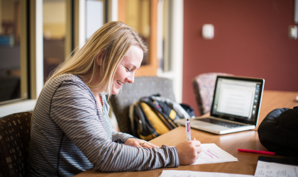 student studying in raynor