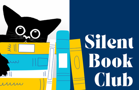 black cat with pile of books