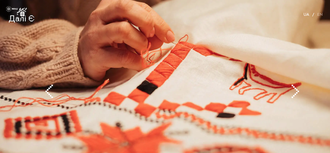 person embroidering