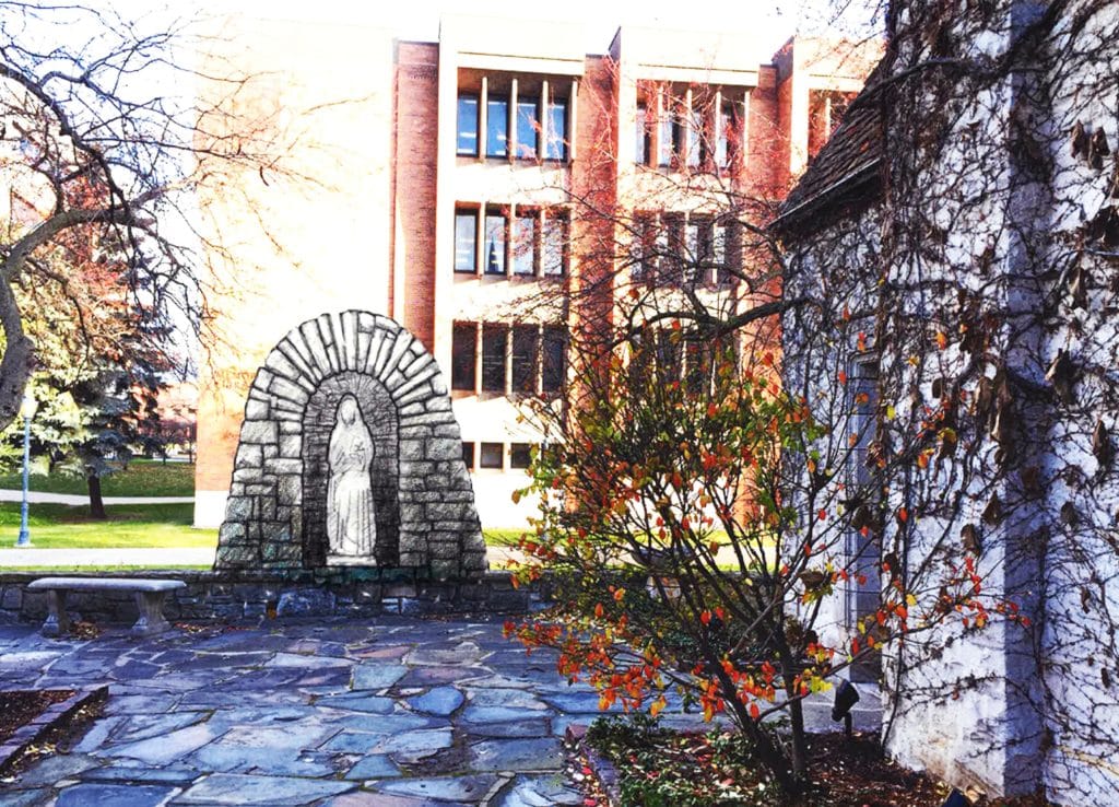 Conceptual image of the grotto of the Blessed Virgin Mary behind St. Joan of Arc Chapel