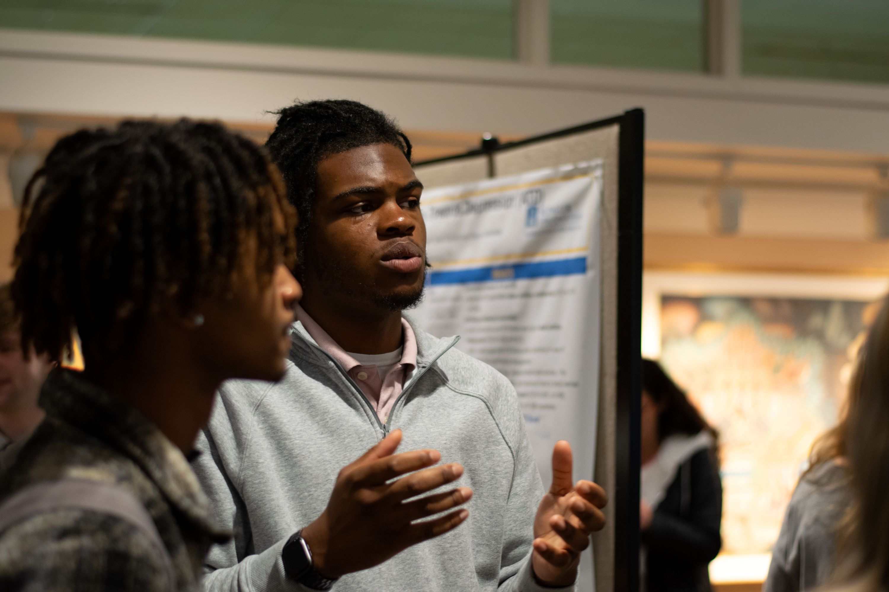 Photo 2 of UG Student at Poster Presentation 2025