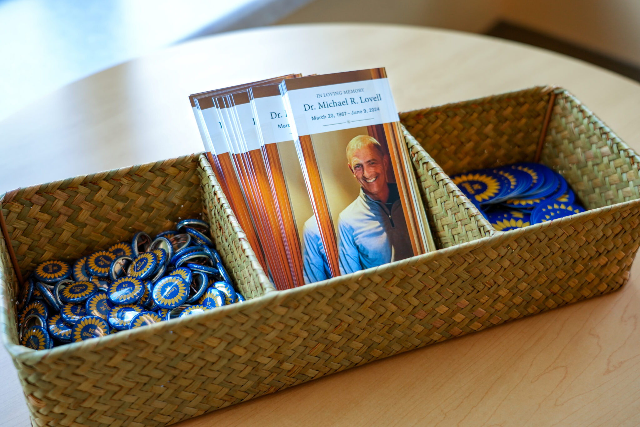 A basket of pins and stickers. 